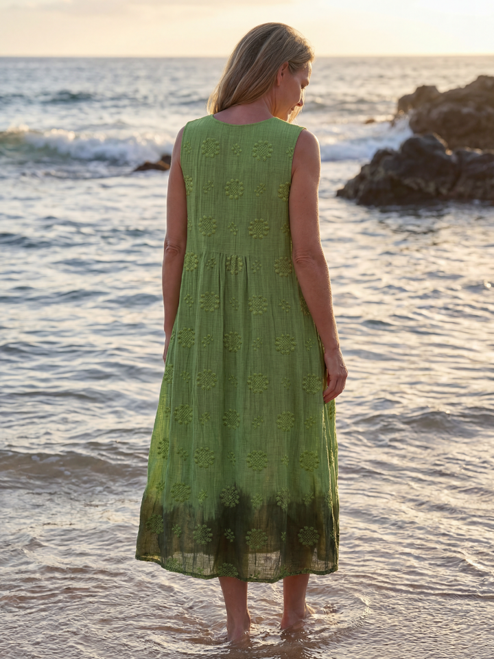 Green textured women's midi dress, sleeveless & relaxed fit. A comfortable pull-on summer dress for casual everyday wear.