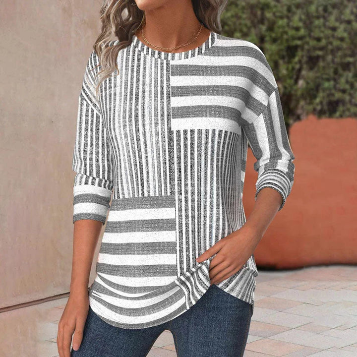 Women's grey knit patchwork striped 3/4 sleeve blouse; comfortable crew neck top for casual everyday style.