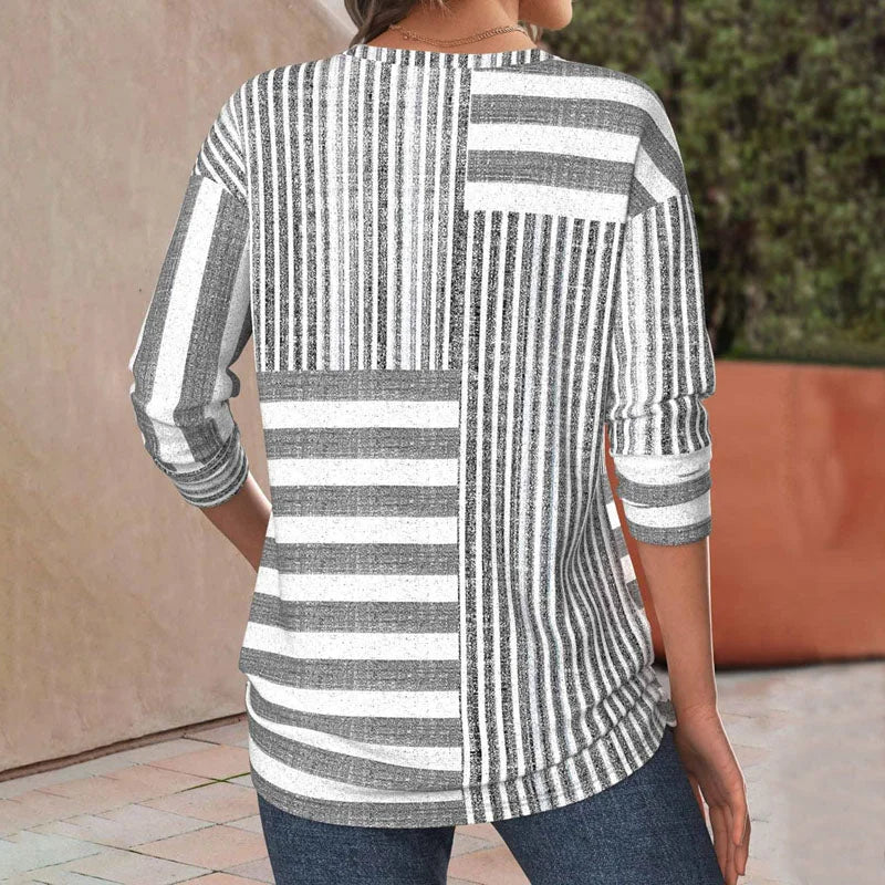 Casual women's knit patchwork blouse with chic stripes & 3/4 sleeves; a comfortable grey top for everyday fashion.