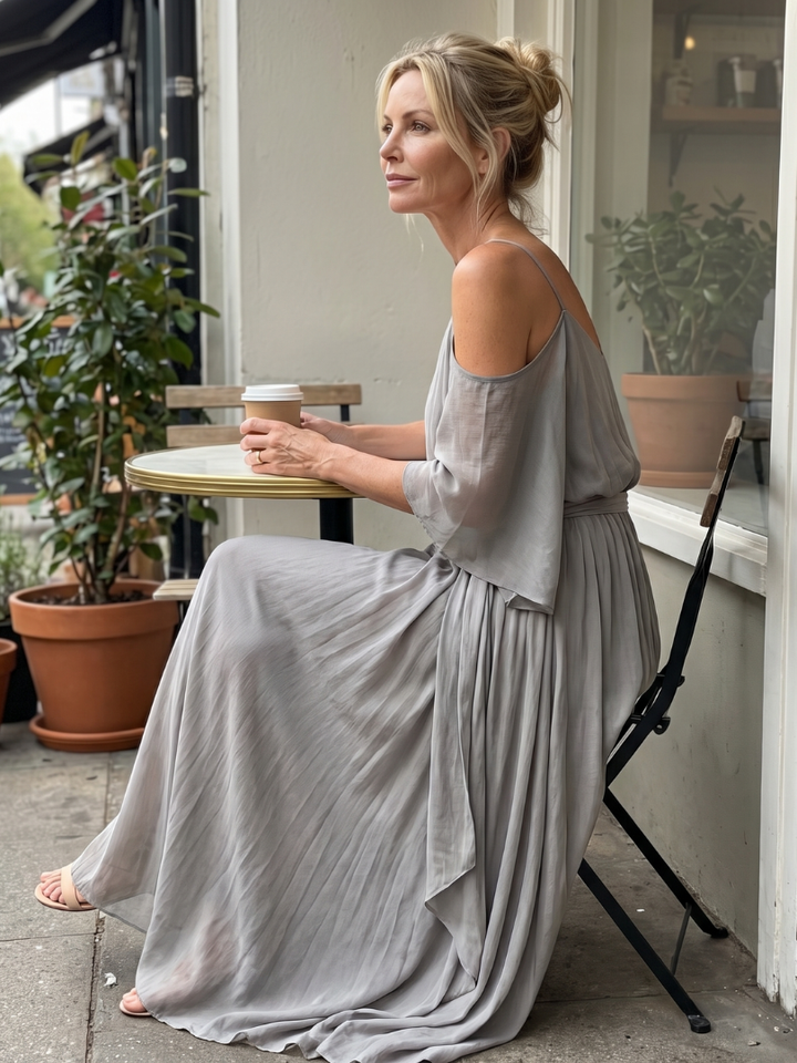 Grey women's two-piece set: layered drape cold shoulder top & wide leg pants for a comfortable, versatile look.