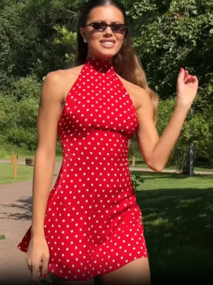 Comfortable women's dot print halter mini dress. Versatile for casual summer wear, beach trips, or parties.