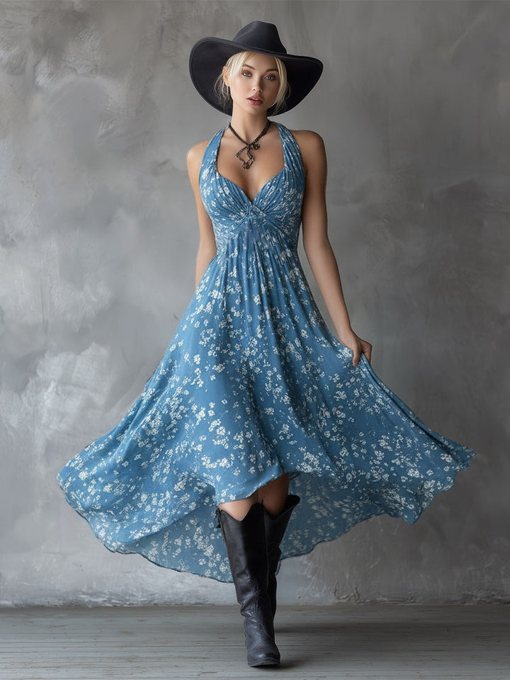 Women's casual floral halter dress with ruched body and trendy asymmetrical skirt.