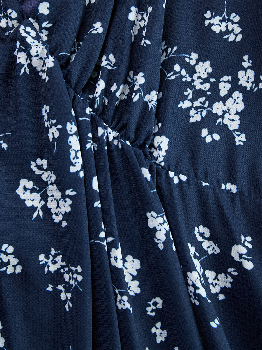 Feminine floral halter ruched asymmetrical dress, a must-have for women's summer wardrobe.