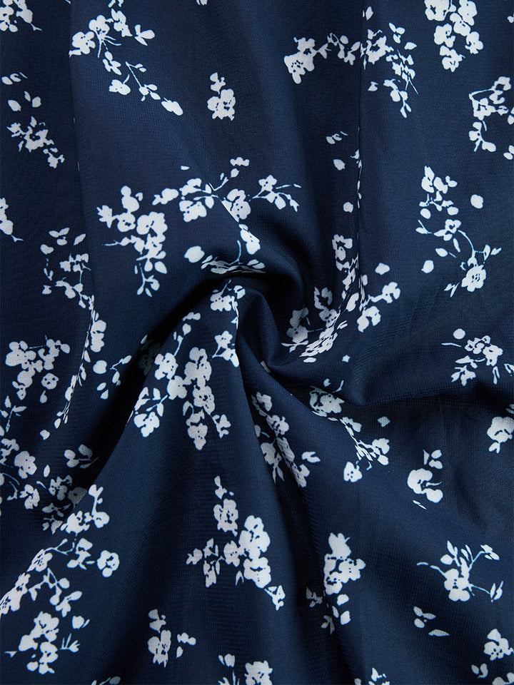 Trendy women's floral halter dress, ruched & asymmetrical, offering both comfort and style.