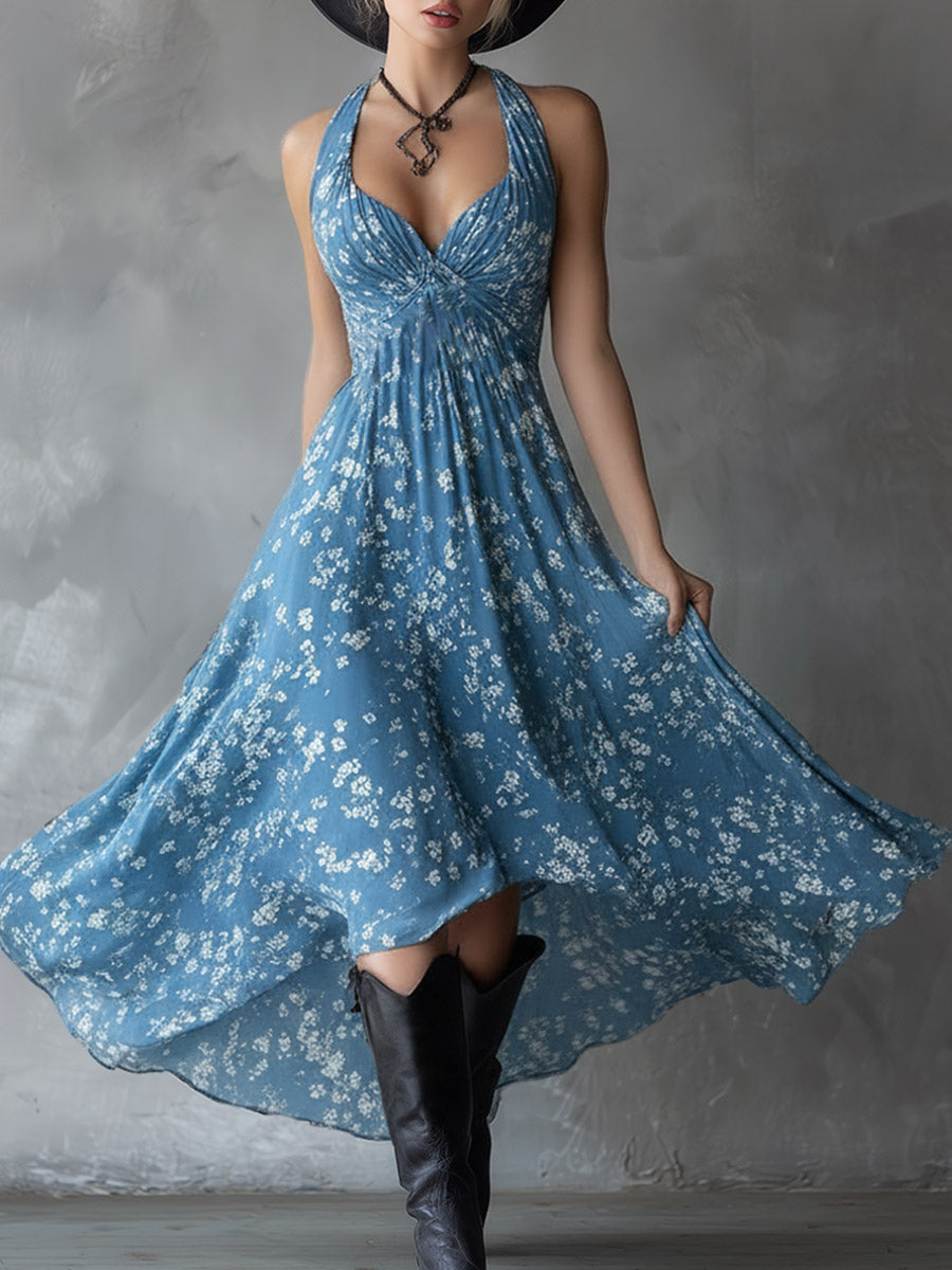 Fitted women's floral halter dress with stylish ruched detailing & asymmetrical hem.