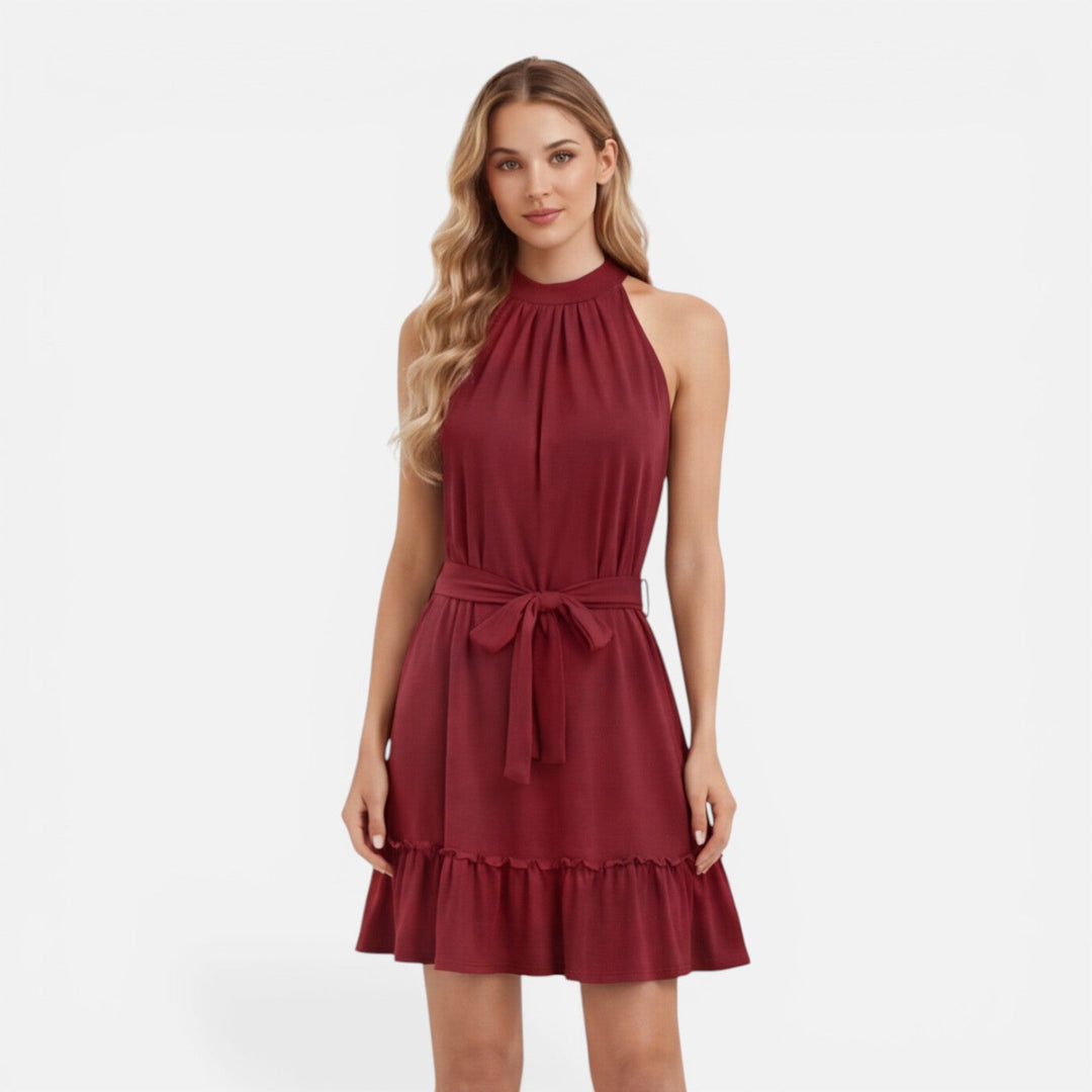 Lightweight women's halter mini dress, versatile for casual or elegant summer occasions.