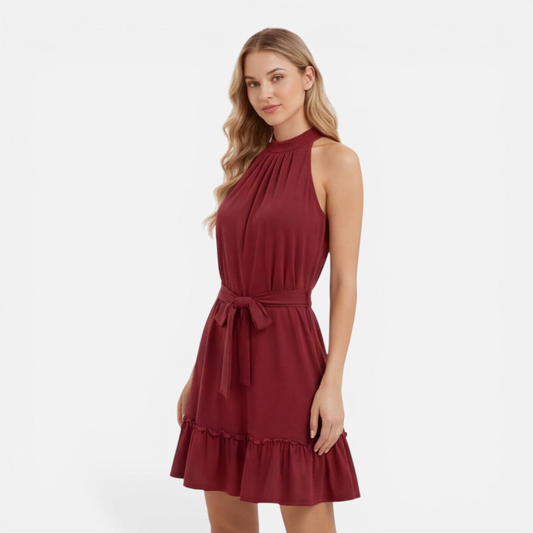 Vibrant red women's halter neck mini dress, designed for comfortable and stylish summer wear.