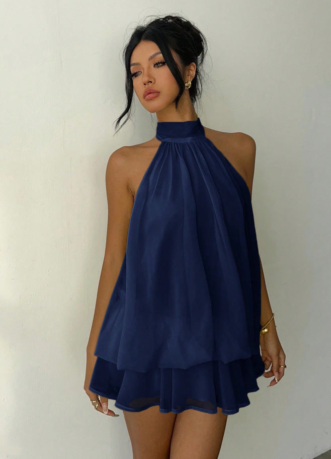 Feminine women's mini dress: halter neck, tiered ruffles, perfect for elegant events.