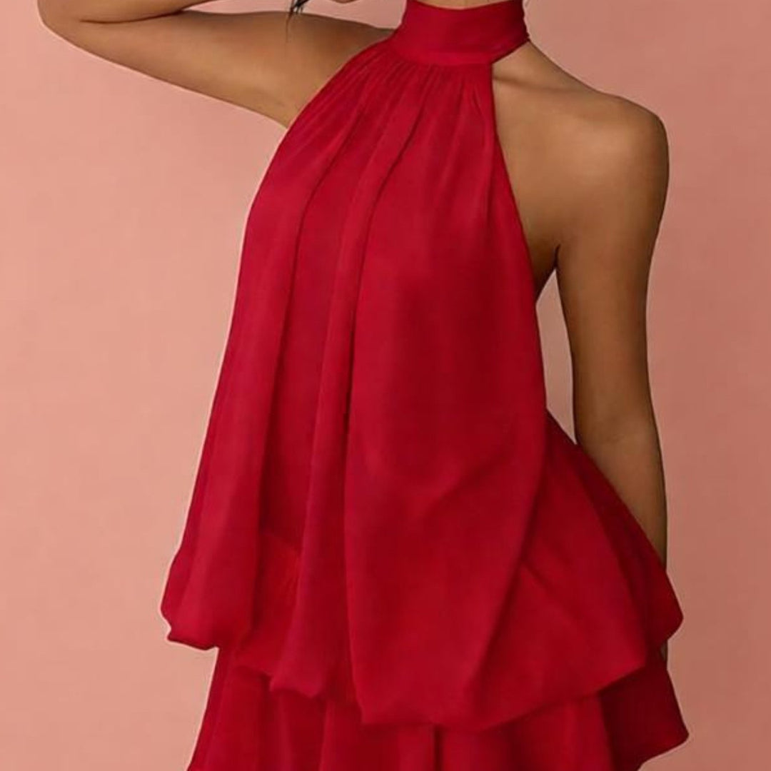 Chic women's party mini dress, featuring a halter neck, tiered skirt, and graceful ruffles.