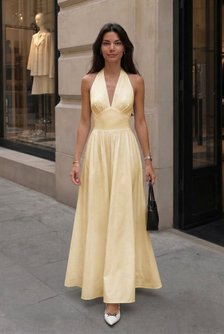 Summer vacation women's dress: elegant halter V-neck maxi, flowy and perfect for resort wear.
