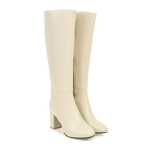 Knee-high women's boots with sturdy block heel & full-length zipper, offering comfort & versatile style for women.