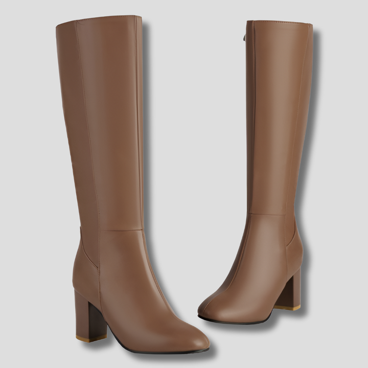 Classic women's heeled knee-high boots with convenient side zipper closure. Comfortable block heel for stylish fashion.