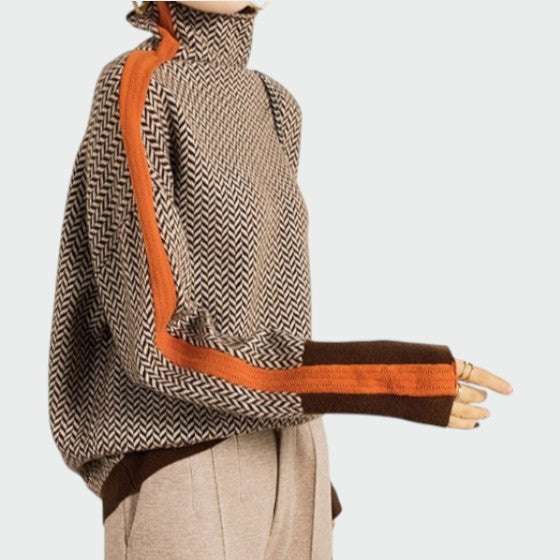 Elegant orange herringbone luxe turtleneck for women, a sophisticated and casual long-sleeve winter fashion top.