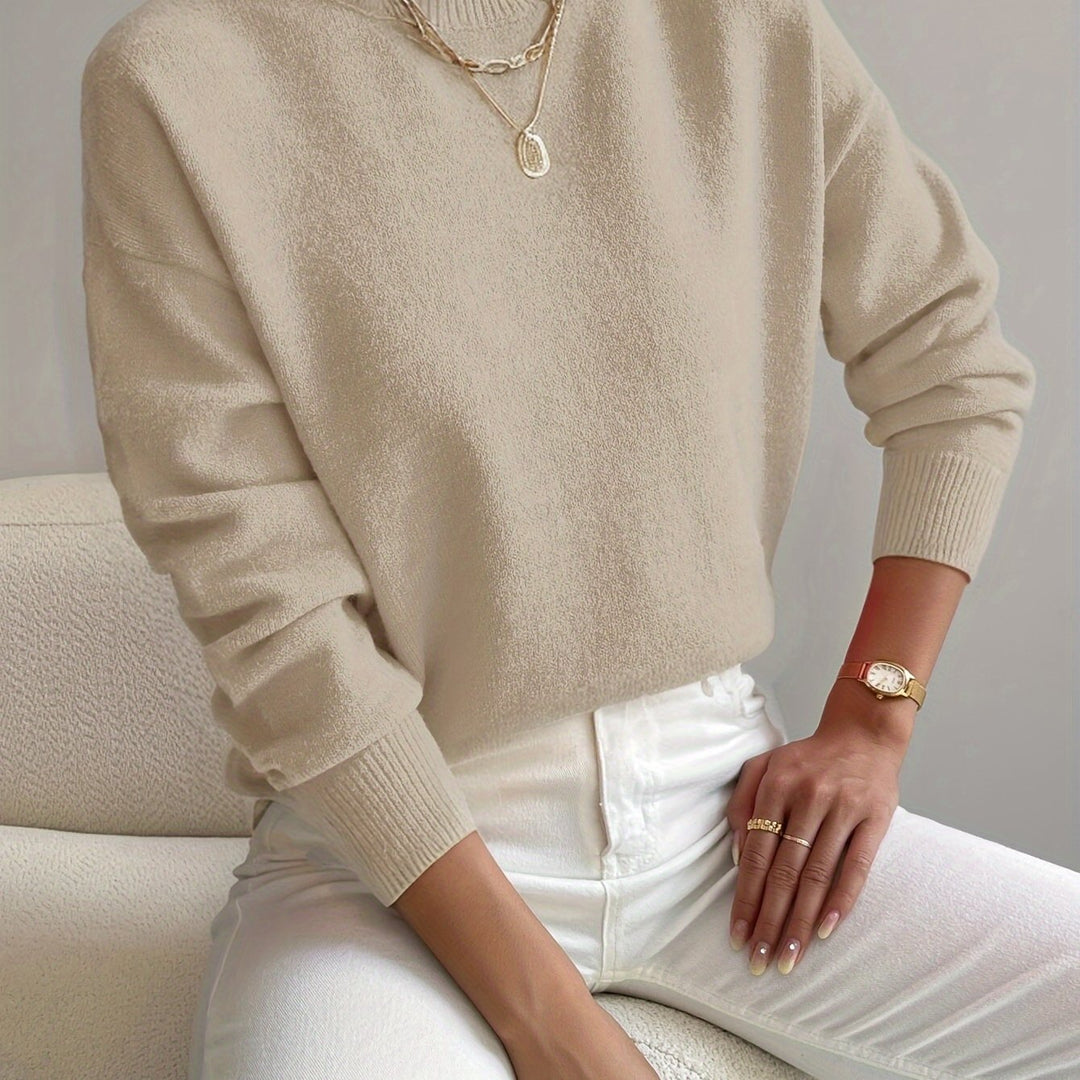 Modern high neck pullover for ladies, perfect for layering over shirts