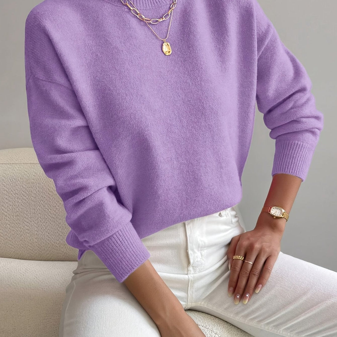 Fashion-forward women's jumper with a contemporary high neck silhouette