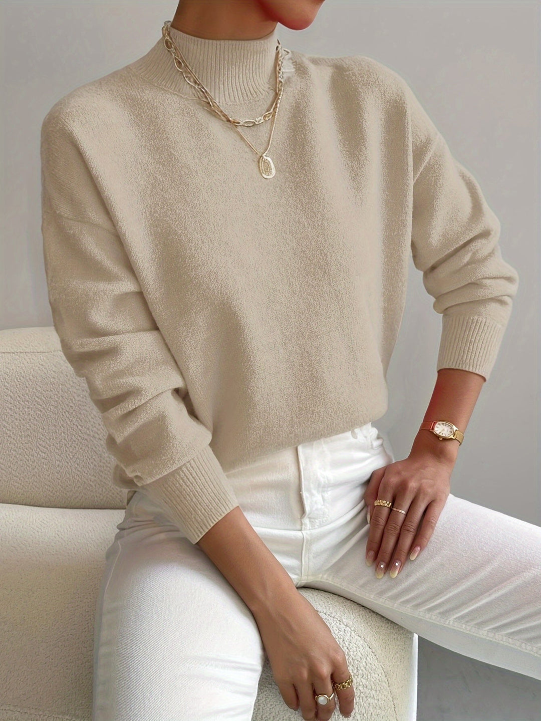 Cozy brown high neck sweater for women, perfect for winter layering