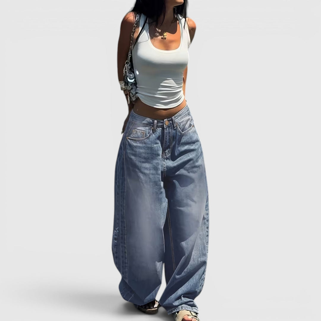 Durable denim baggy jeans, oversized straight leg for women's comfortable everyday wear.
