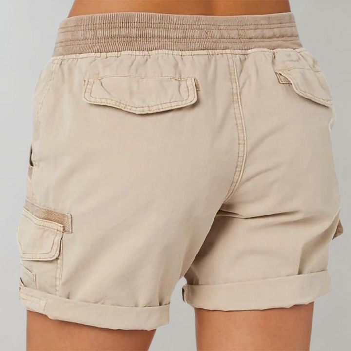 Stylish women's high waist cargo shorts with functional pockets and a comfortable ribbed waistband for practical wear.