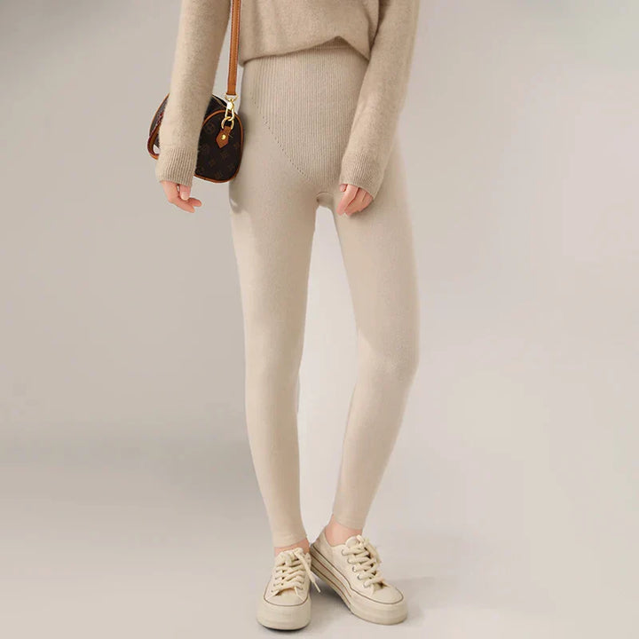 Fine knit women's high waist cashmere leggings, offering warmth & a slim, comfortable fit.