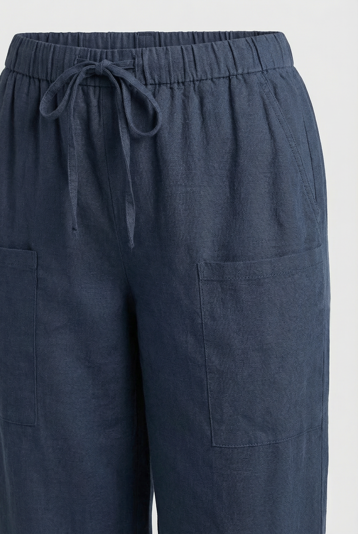 Model wearing high waist cotton pants, showcasing their versatile casual style.