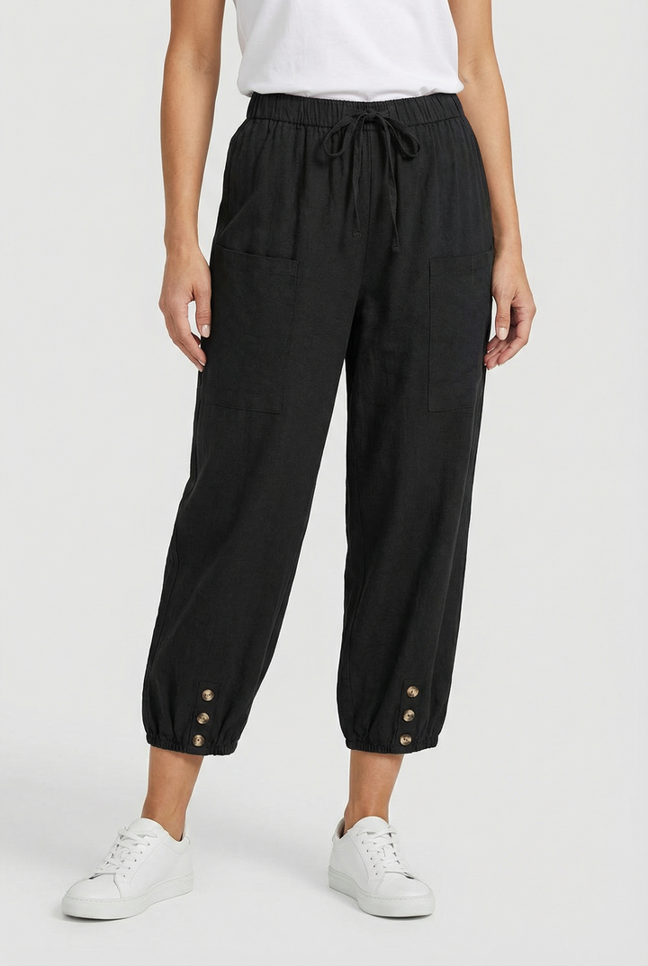 Comfortable fit emphasized on these women's high waist cotton trousers.