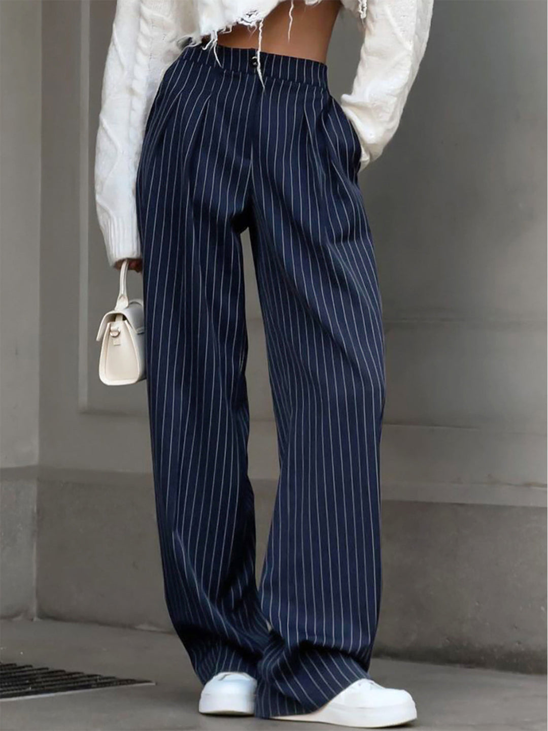 Women's high waist pinstripe wide leg trousers, perfect for a chic modern office or elegant casual look.
