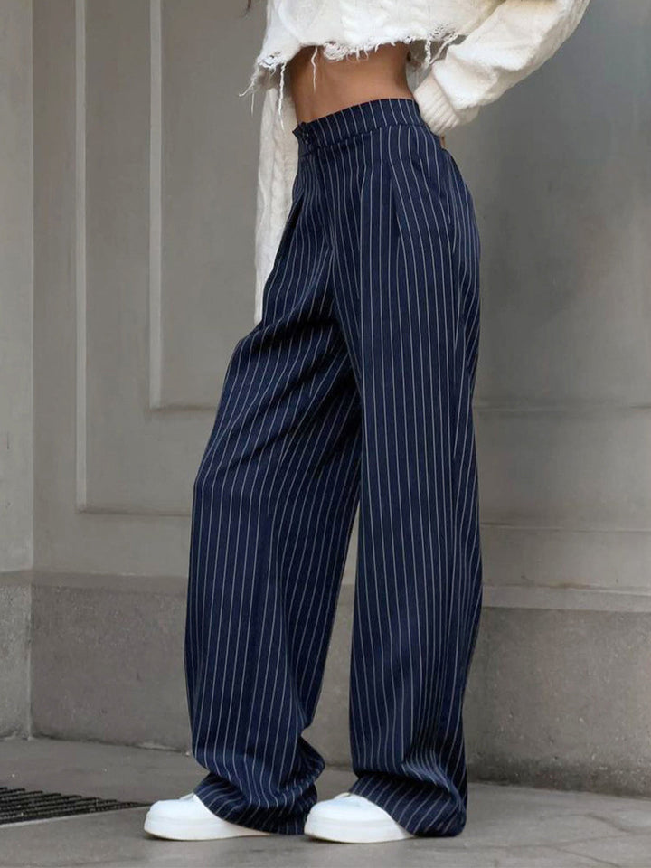 Versatile women's pinstripe wide leg trousers, ideal for stylish office wear or chic casual outfits.