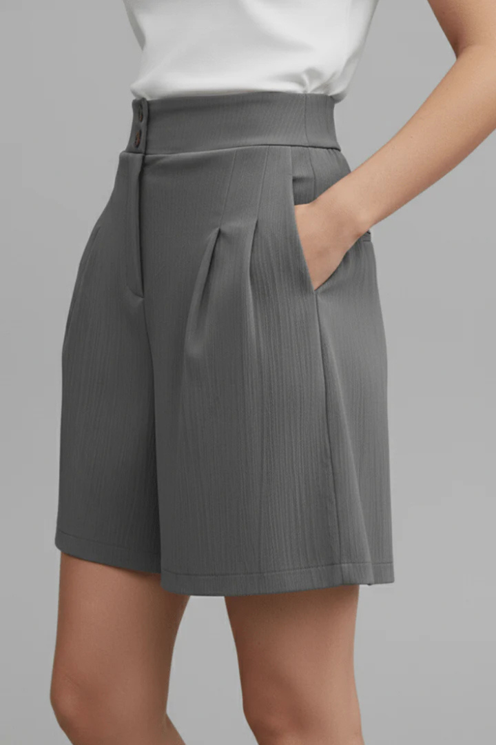 Comfortable high waist Bermuda shorts, women's tailored pleated design. Great for versatile summer fashion.