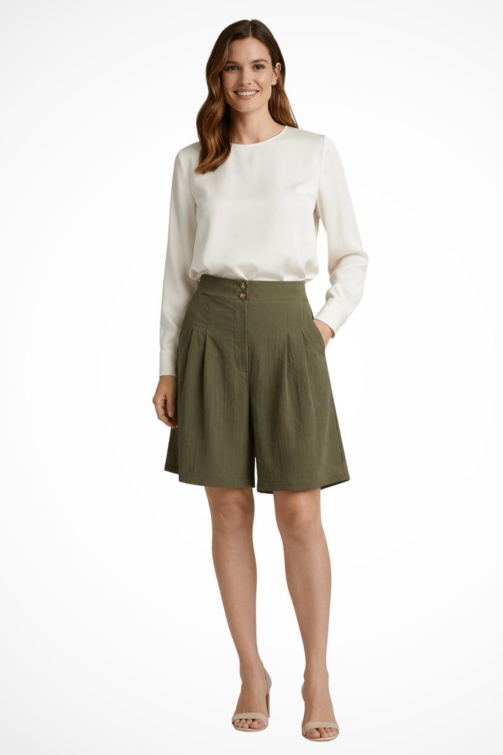 Soft tailored women's high waist pleated Bermuda shorts, offering comfortable, chic summer wear.