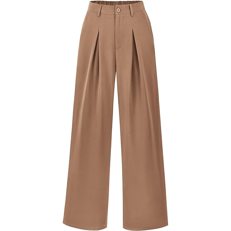 Fabric detail of women's high waist pleated wide leg trousers, highlighting quality and drape.