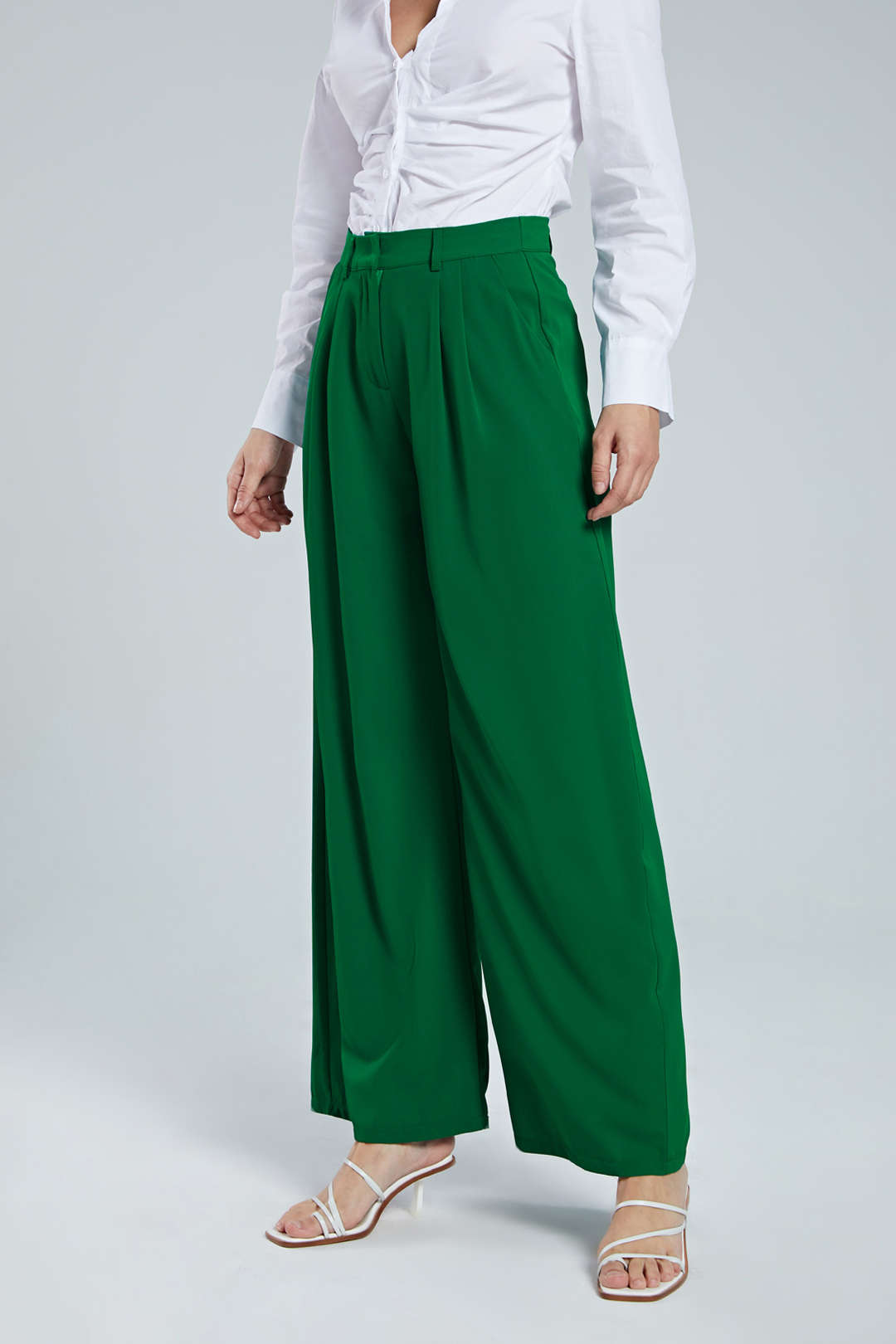 Comfortable wide leg trousers for women, featuring a high waist and chic pleats. Versatile style.