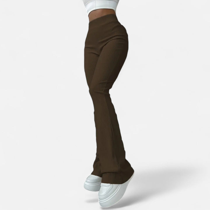 Textured ribbed high-waist women's leggings with a slim fit, great for fashion & comfort.