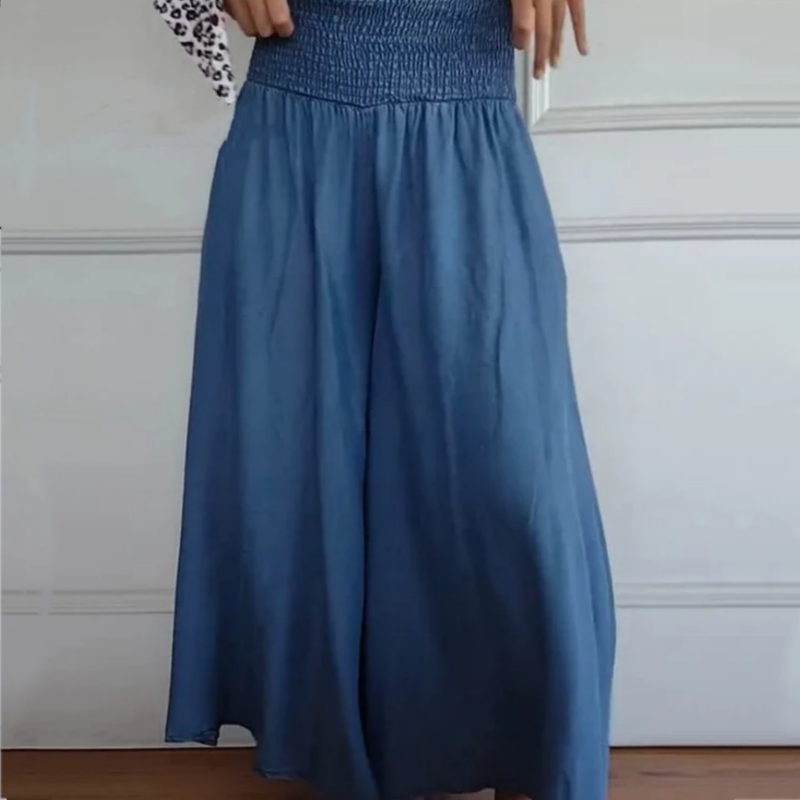 Comfortable women's wide-leg denim trousers with high-waist & smocked band, perfect for casual wear.