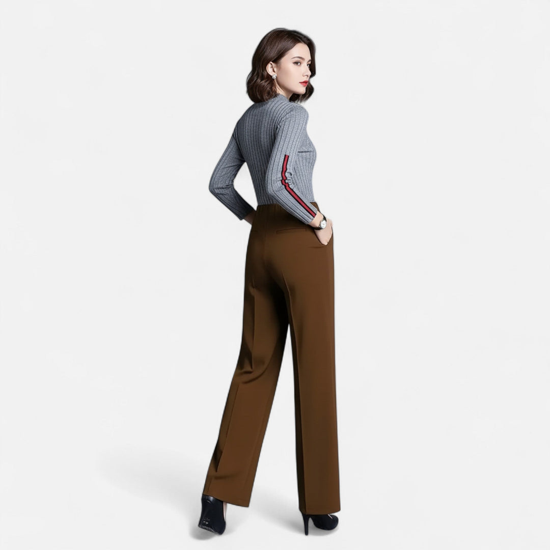 Model wearing casual high-waist straight-leg trousers for everyday stylish wear.
