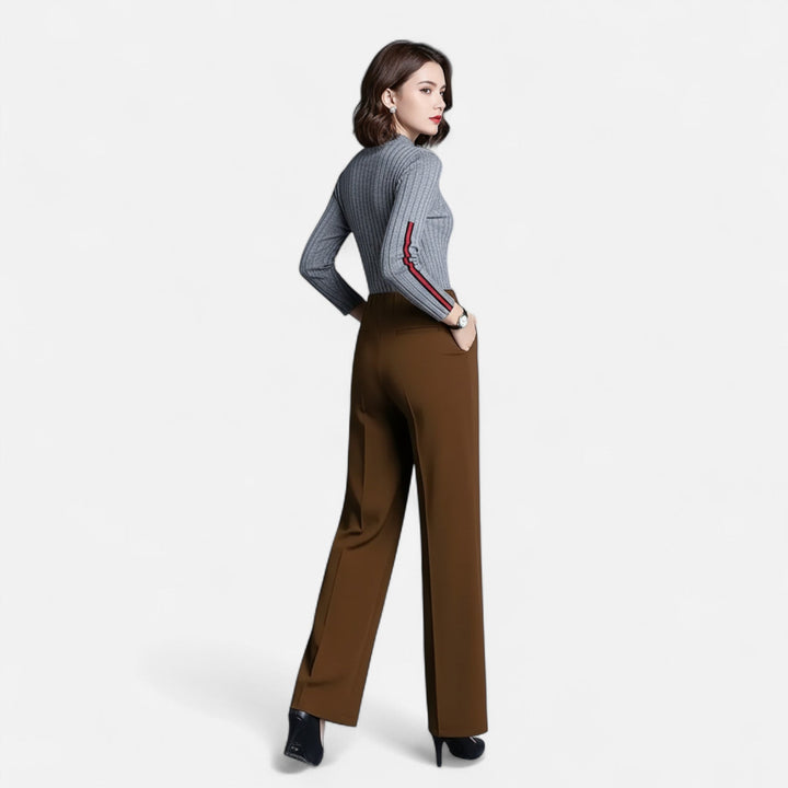 Model wearing casual high-waist straight-leg trousers for everyday stylish wear.