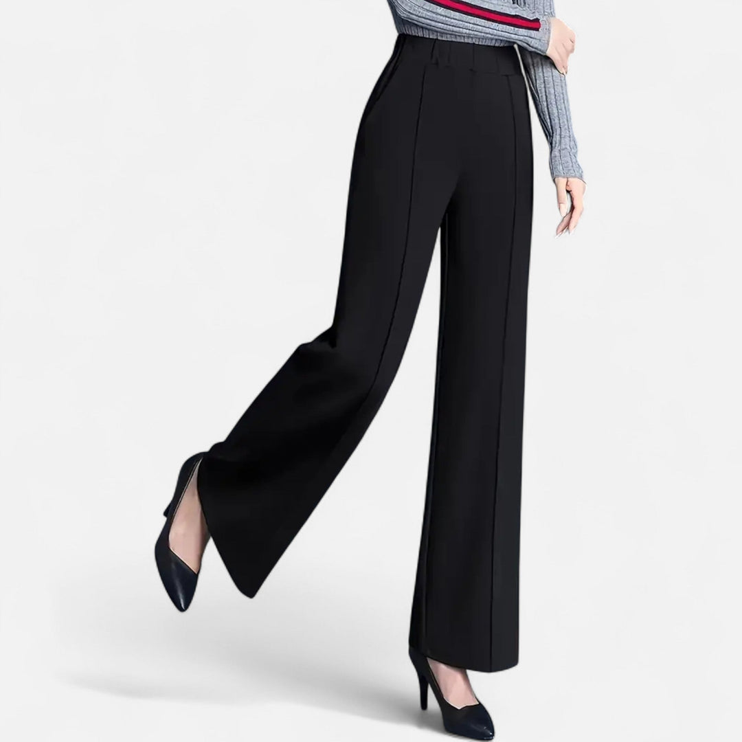 Side view of women's high-waist trousers highlighting their elegant straight-leg silhouette.