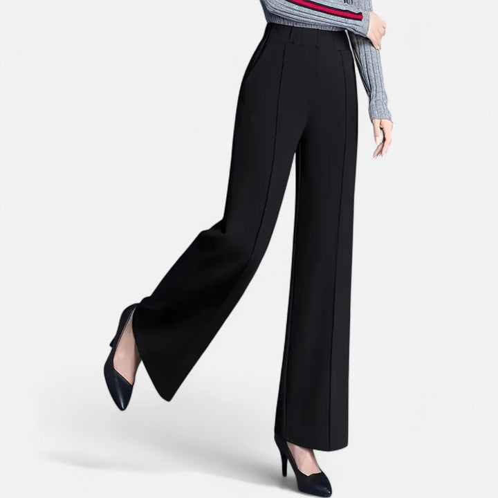 Side view of women's high-waist trousers highlighting their elegant straight-leg silhouette.