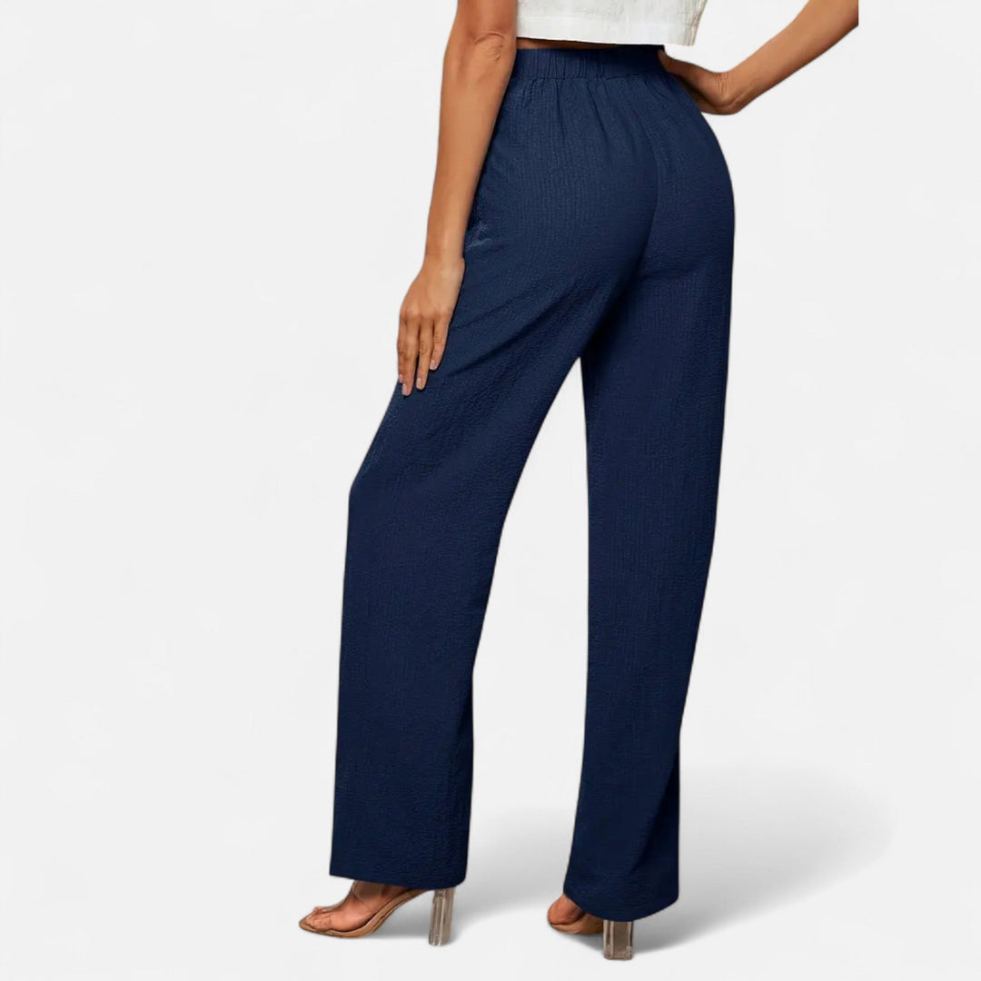Comfortable and chic women's high-waist pants in a versatile brown shade, perfect for everyday style.