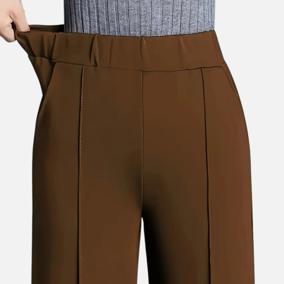 Stylish women's straight-leg trousers with a modern high-rise design and easy-care fabric.