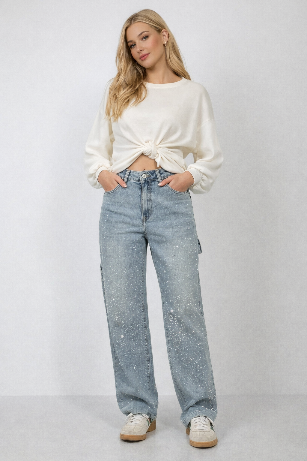 Women's high-waist straight leg vintage denim jeans with elegant crystal details.