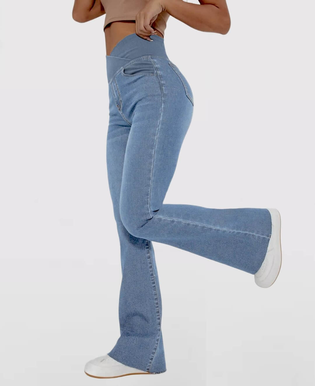 Dark blue high-waist stretch jeans for women, comfortable slim fit for casual wear.