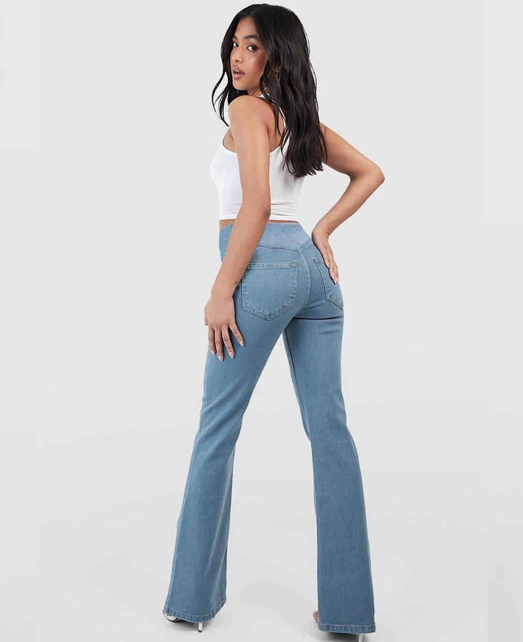 Grey slim fit high-waist stretch jeans for women, perfect for everyday comfort.