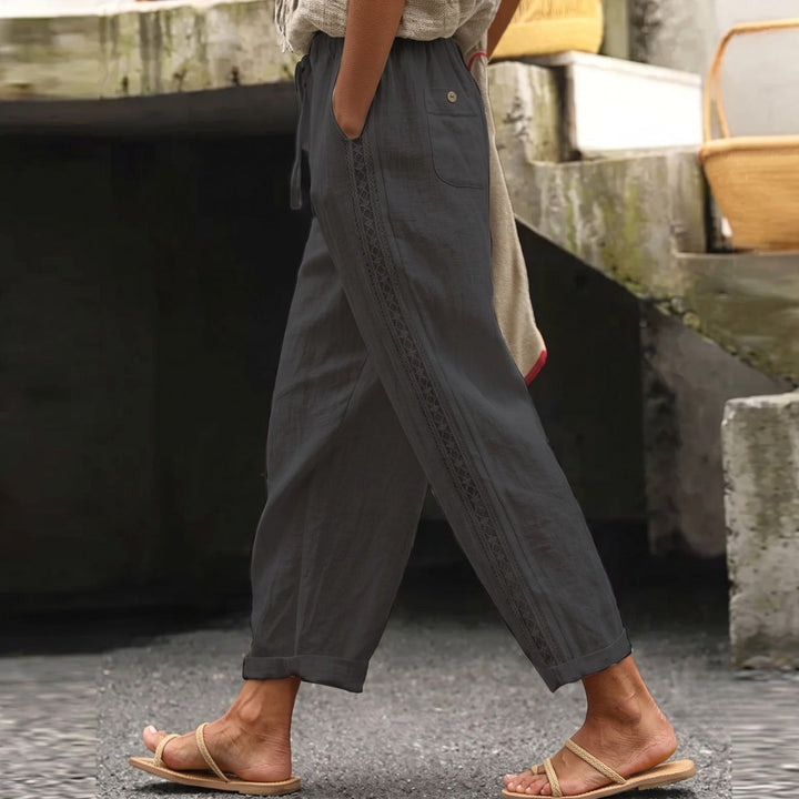 Versatile women's high-waist striped trousers, ideal for stylish summer outfits, casual looks, or office wear.