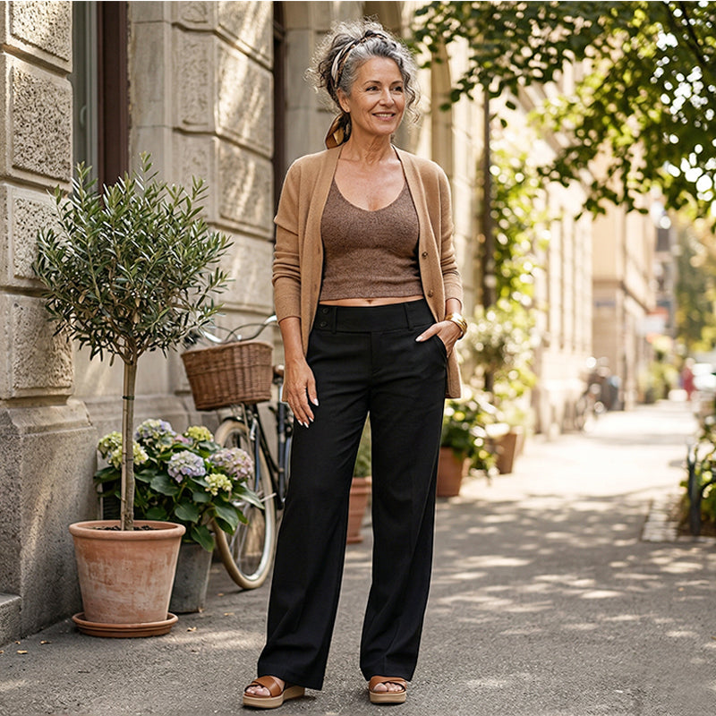 Women's high waist tailored wide leg trousers in classic black. Perfect for work or elegant casual wear.