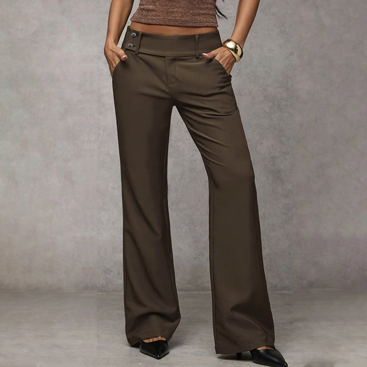 Smart women's high waist flared trousers. Tailored wide leg pants are perfect for work or sophisticated leisure.