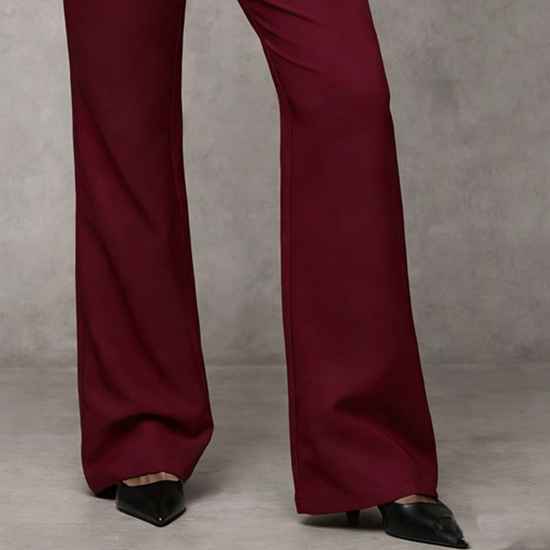 Stylish women's tailored wide leg trousers in grey. High waist design offers an elegant, professional aesthetic.