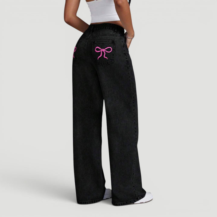 Women's high waist wide leg denim trousers for versatile casual wear.