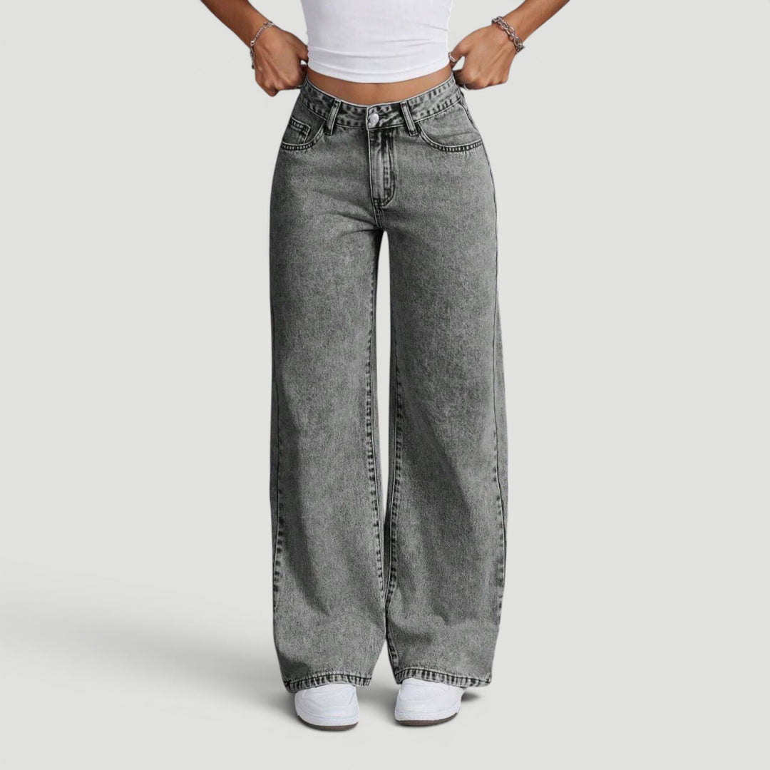 Comfortable women's denim trousers with a high waist and wide leg cut.