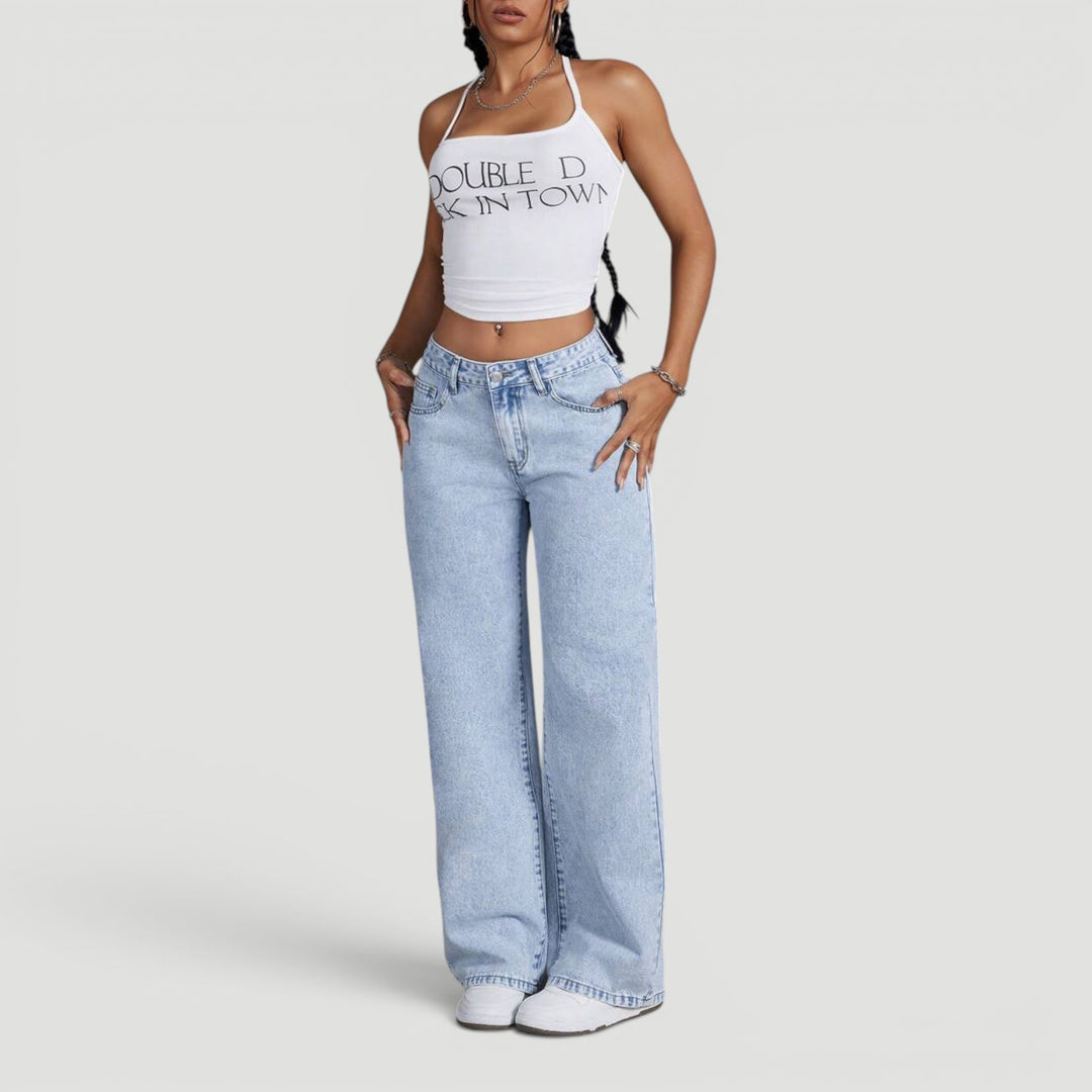 Stylish high waist wide leg denim trousers for women, embroidered detail.