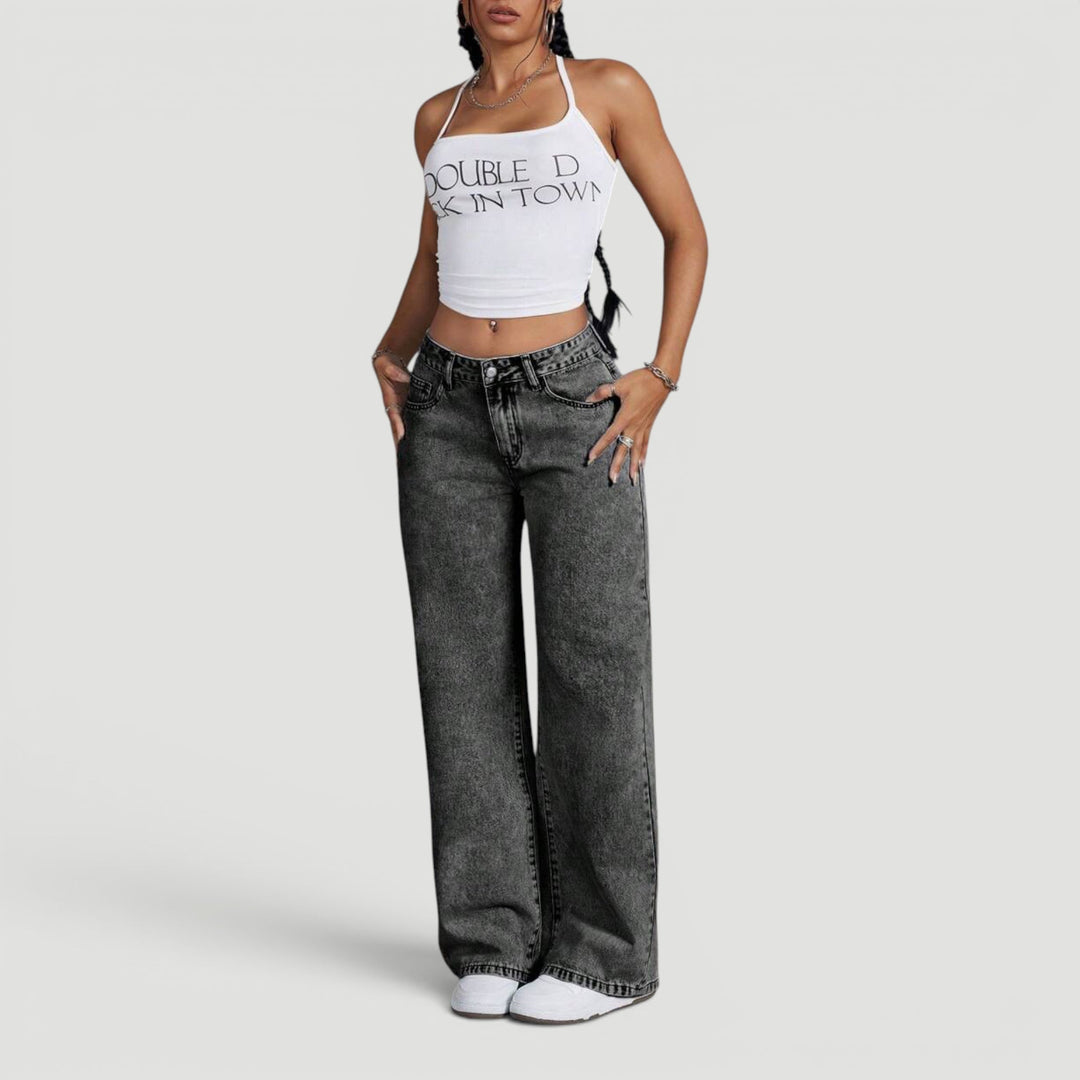 Embroidered women's denim trousers, high waist and wide leg for modern fashion.